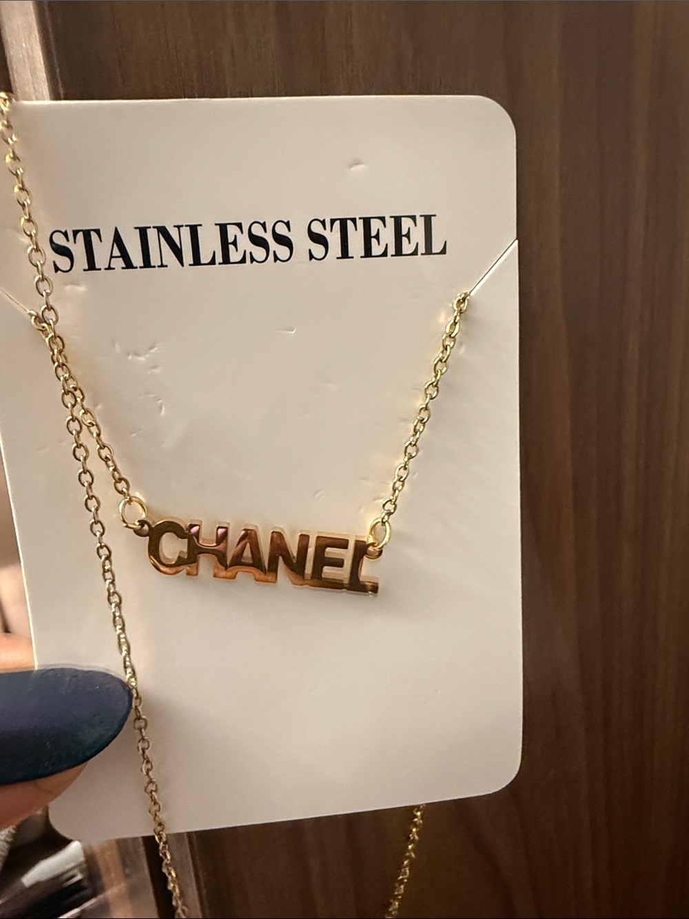 CHANEL Gold Tone Logo Nameplate Necklace